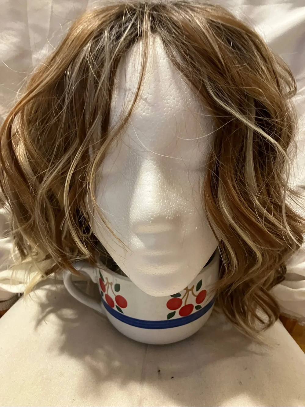 New.  Multi color ( at least 5 different shades ) shaggy n free style wig